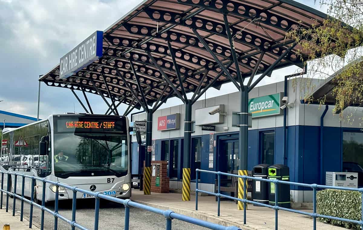 Luton Airport car hire centre. A free shuttle bus to the airport is waiting