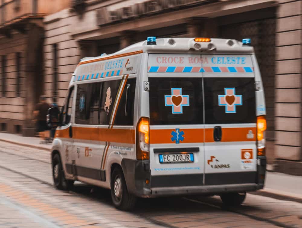 Italian ambulance driving along a city street.
