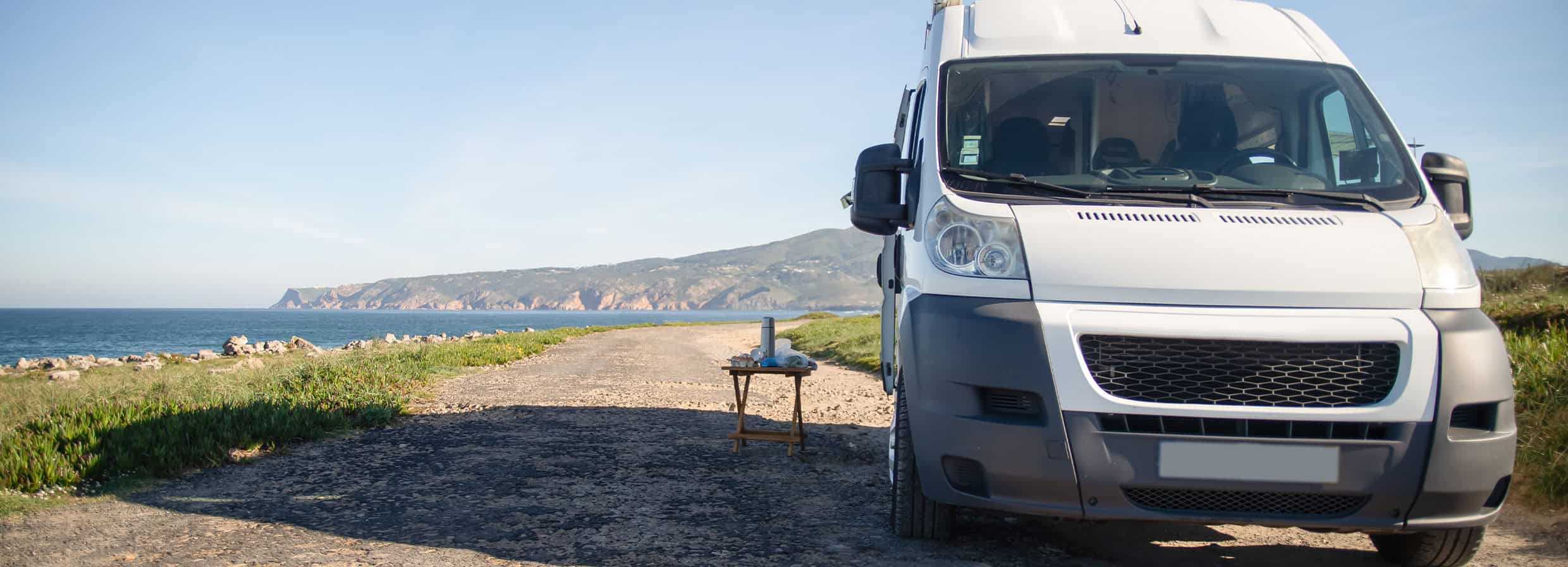 Older Fiat Motorhome parked on a cliff